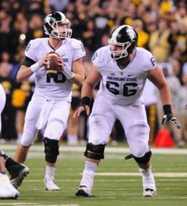 Michigan State center Jack Allen (66) looks to protect quarterback Connor Cook during the Big Ten Championship game on Dec. 5. (Photo courtesy Michigan State)