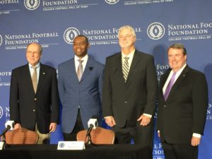 (Left to right) College Football Playoff Executive Director Bill Hancock, former UNLV quarterback and punter Randall Cunningham, former Harvard tight end and punter Pat McInally, and National Football Foundation President and CEO Steve Hatchell at the College Football Hall of Fame announcement on Jan. 8 in Scottsdale, Arizona.