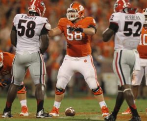 Clemson offensive lineman Ryan Norton calls out coverage prior to a snap against the Georgia Bulldogs. (Photo courtesy Clemson Athletics)